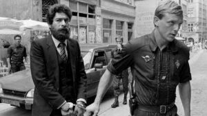 File photo: file photo show larf activist george ibrahim abdallah escorted by a french gendarme as he arrives at lyon courthouse
